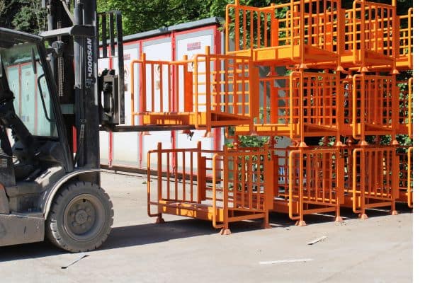 Moving gas cylinder transport cages around the yard