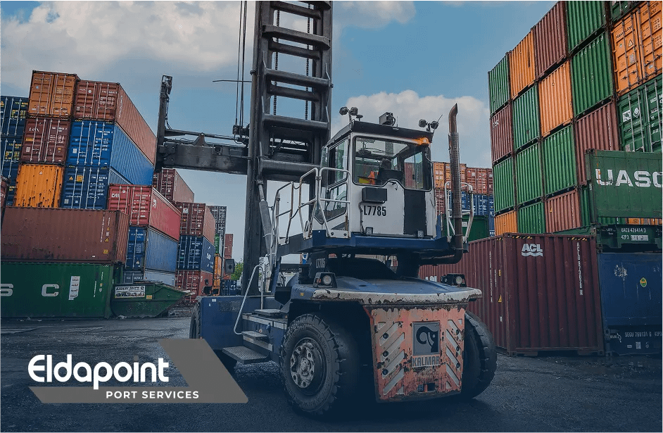 Moving shipping containers around the Eldapoint site using a crane