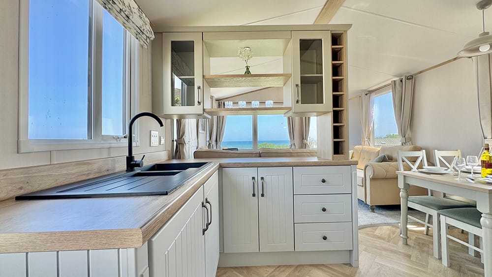 atlas-debonair-kitchen-4991 Bron-Y-Wendon Holiday Park caravan with the sea behind