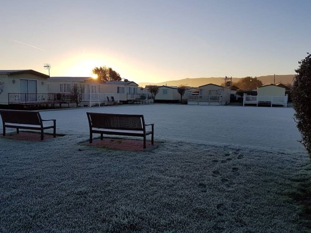 Looking across the field at Pentre Mawr Caravan Park on a frosty morning