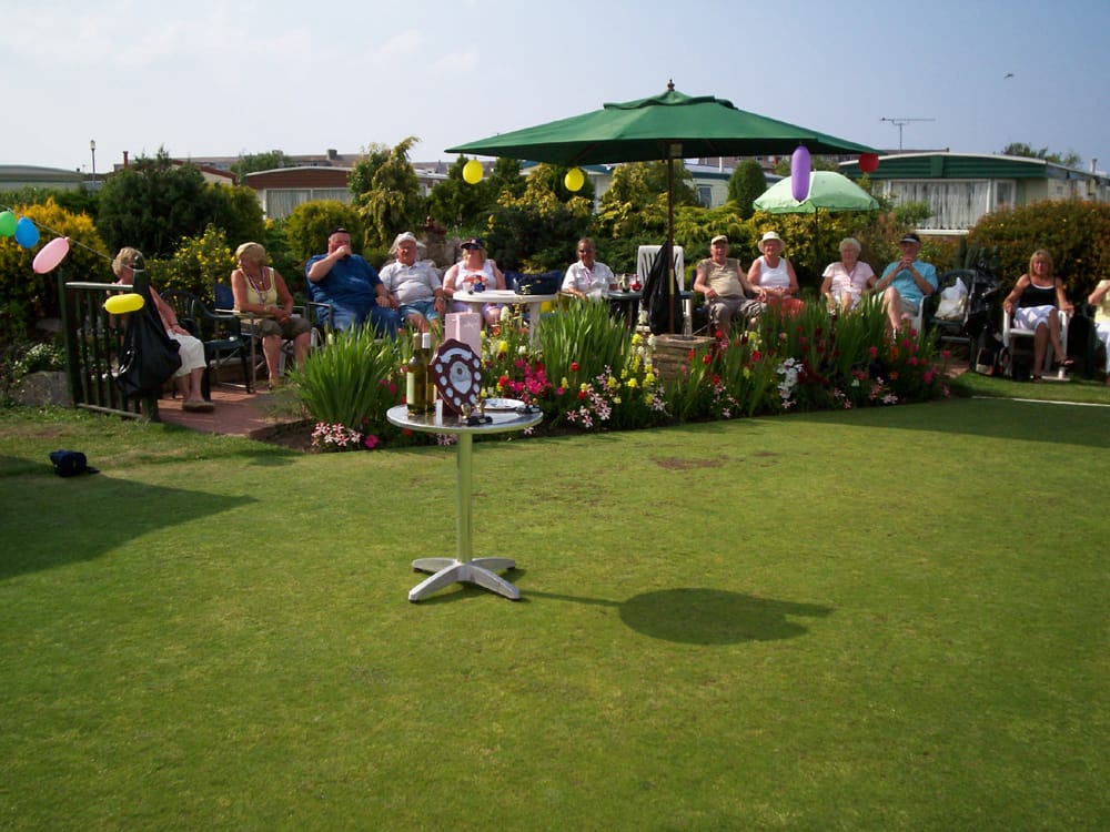Crowd of people on the field at Pentre Mawr Caravan Park