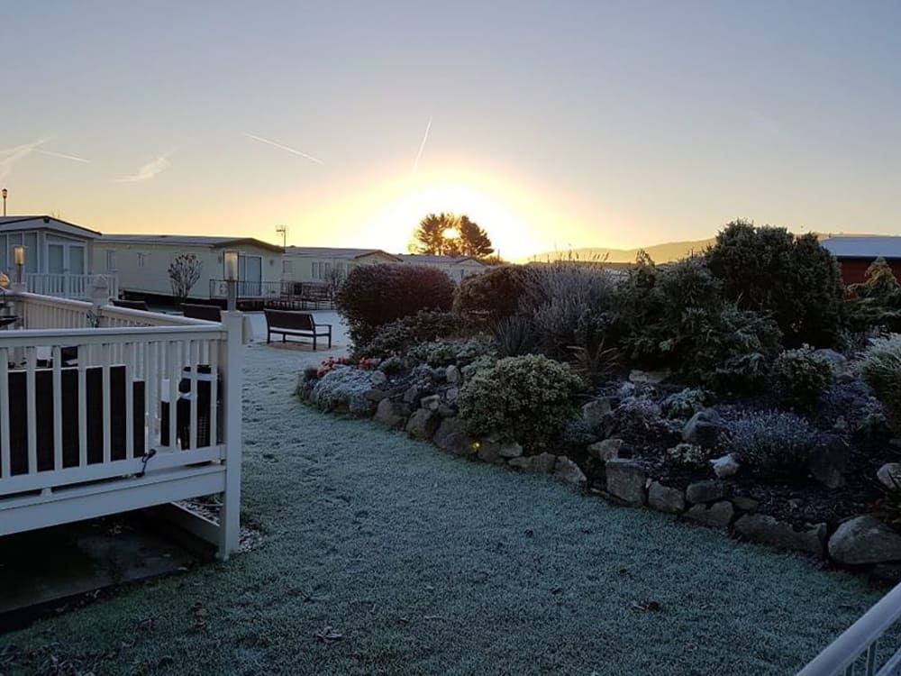 Looking across the field at Pentre Mawr Caravan Park on a frosty morning