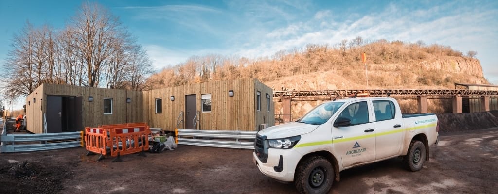 Panoramic shot of a works van parked outside the new TF Jackson building at Torr Works Quarry