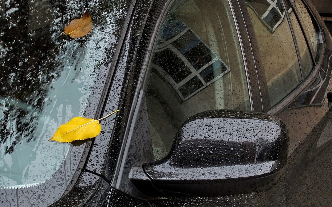 Closeup of a car in the rain