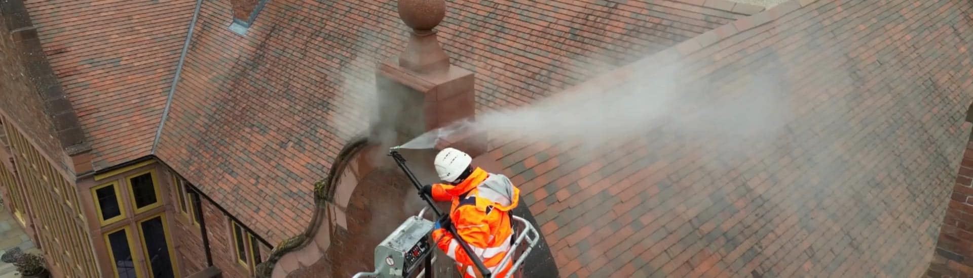 Pressure washing roof
