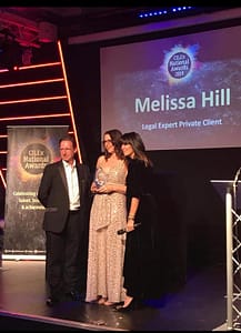 Melissa Hill winning award