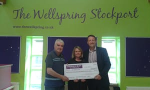 Thorneycroft director Mark Belfield presents The Wellspring with fundraising cheque