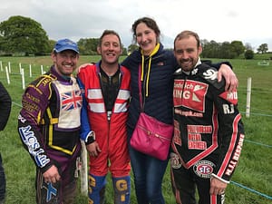 Mary Lomas from Thorneycroft Solicitors with motorcycle riders at Gawsworth Cheshire Grasstrack Club