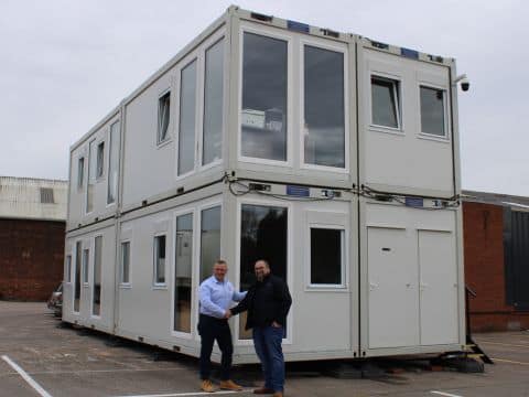 A TF Jackson team member hands over a new prefabricated modular building to customer ADS Truckstop