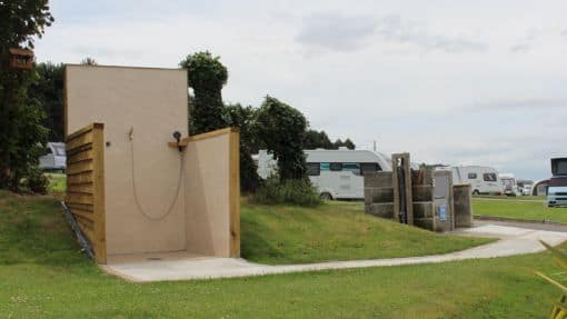 Untitled design - 2024-07-30T162837.762 The newly installed outdoor dog-shower at Bron-Y-Wendon