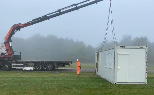 Supervising the placement of prefabricated retail unit for an event