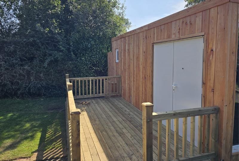 Wood-clad TF Jackson classroom unit