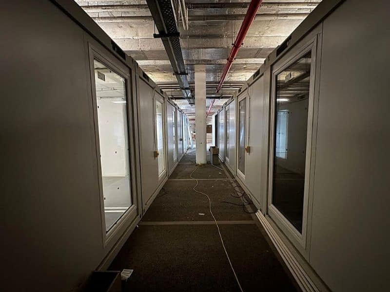 Putting prefabricated buildings inside existing structures can be challenging