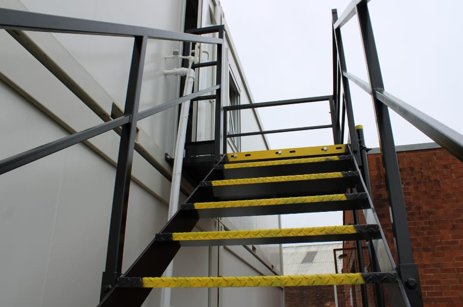 Exterior steel staircase on the new modular building at ADS truckstop