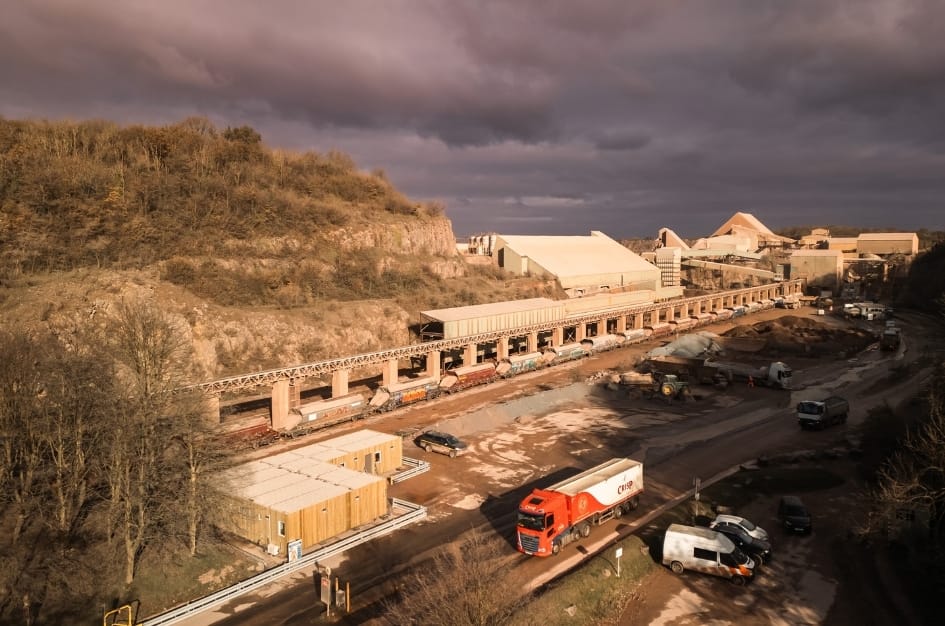 Aerial shot of the onsite train station at Torr Works Quarry, for loading stone for distribution