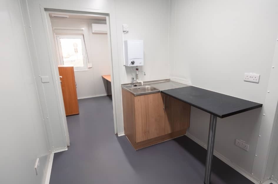 Kitchenette in a TF Jackson welfare unit with sink and worktop