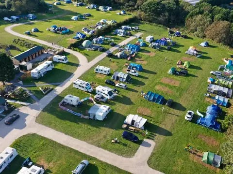 campsite top view with tents and caravans in site